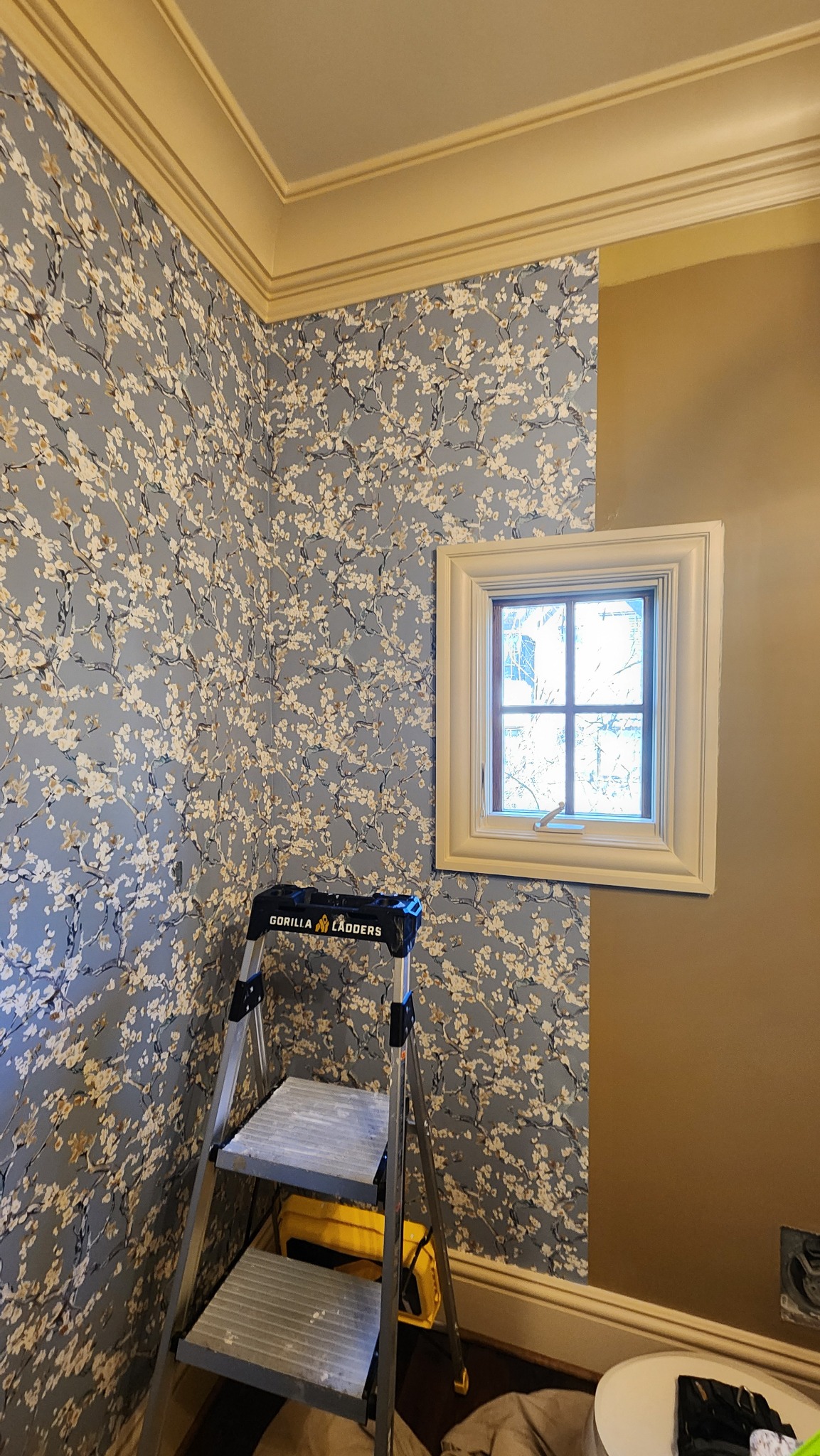 Wallpaper installation in luxury powder room